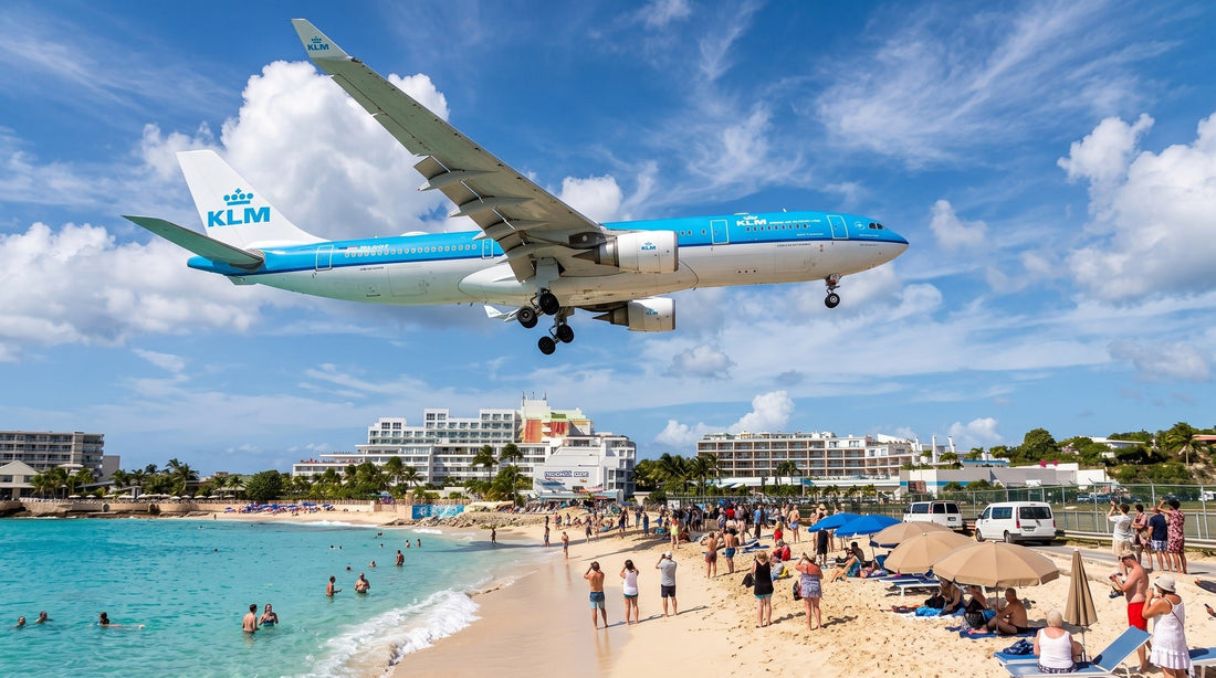 Aircraft above Maho Beach and turquoise water on St. Maarten.