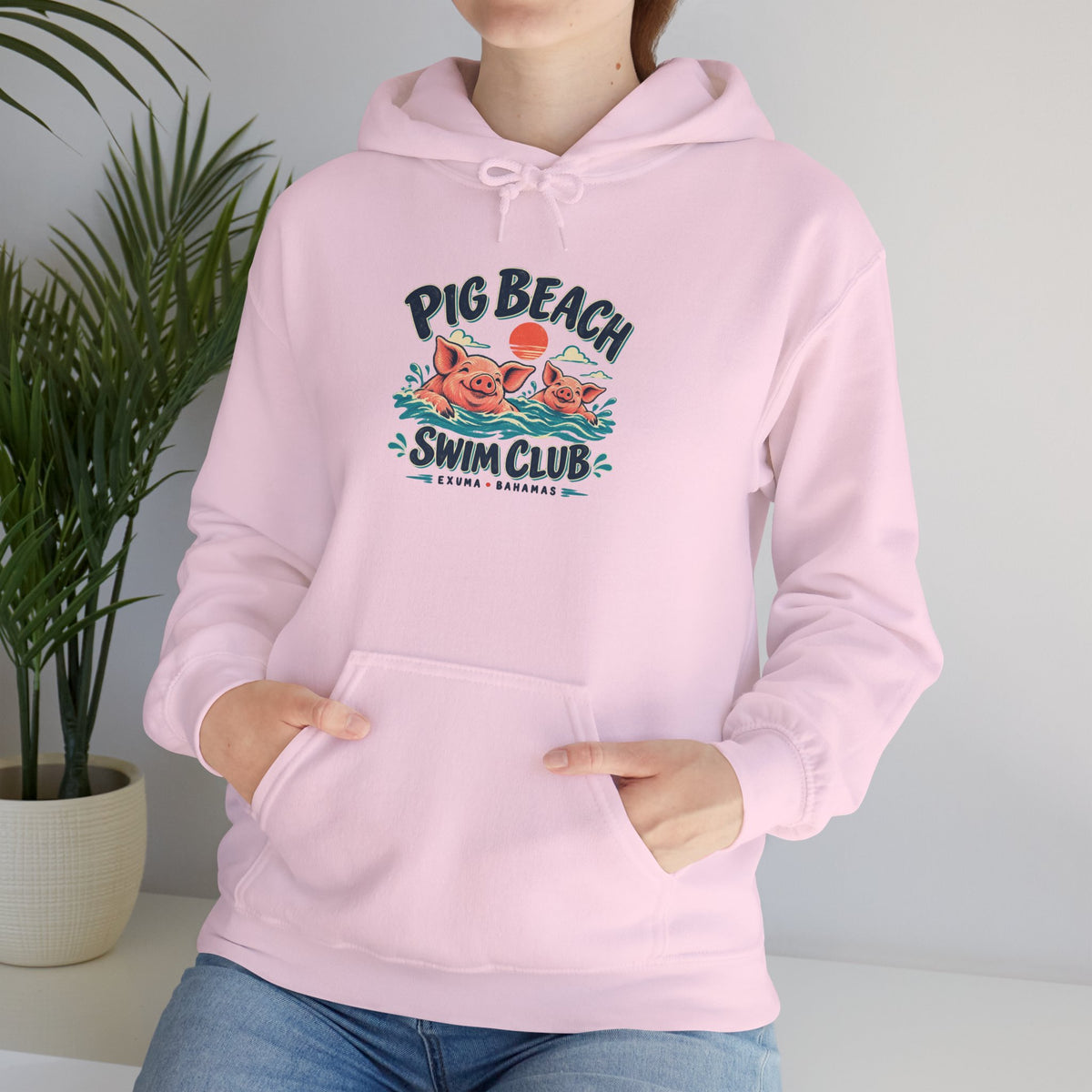 Model wearing the Pig Beach Swim Club Exuma Bahamas Gildan 18500 hoodie.