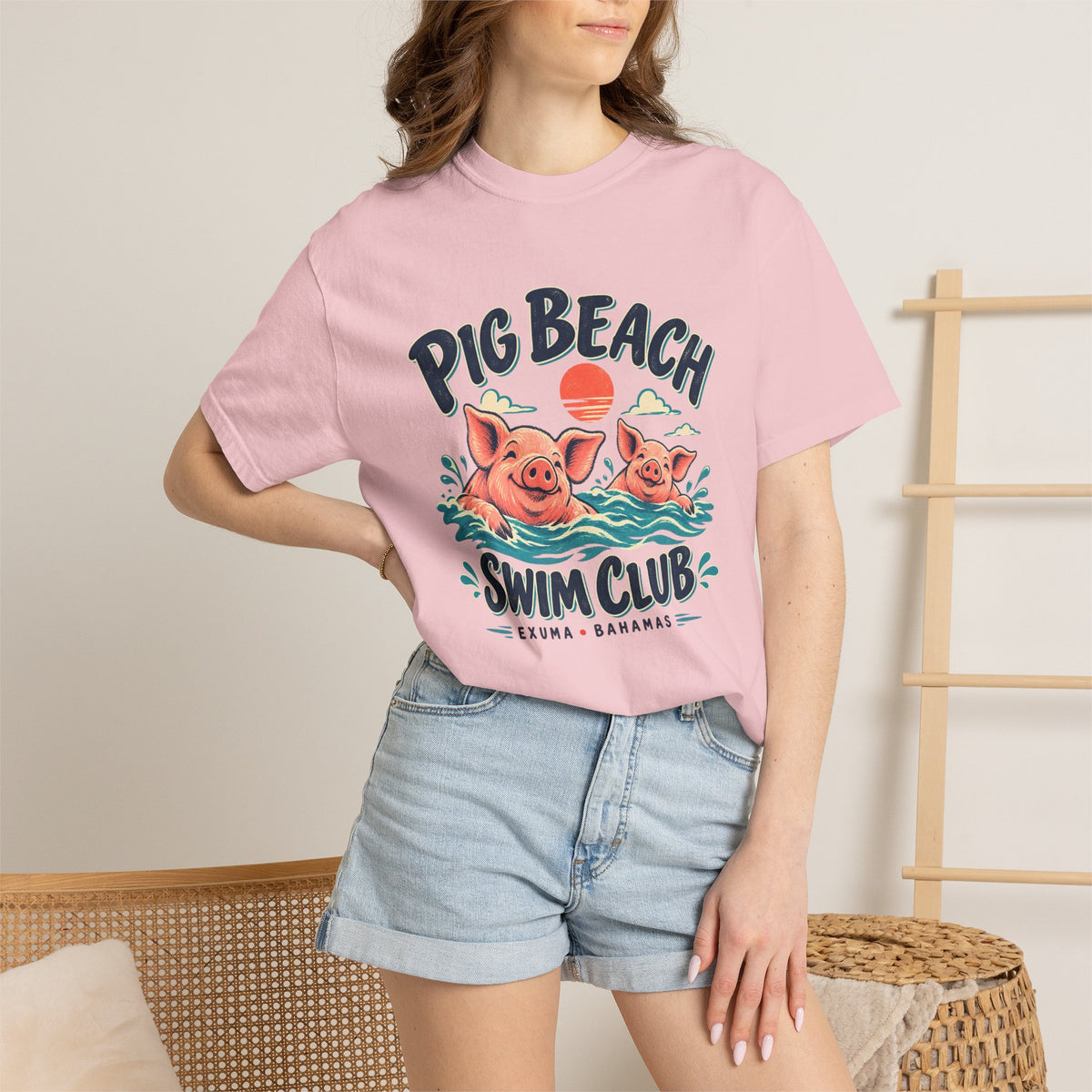 Model wearing the Pig Beach Swim Club Exuma Bahamas Comfort Colors 1717 T-shirt.