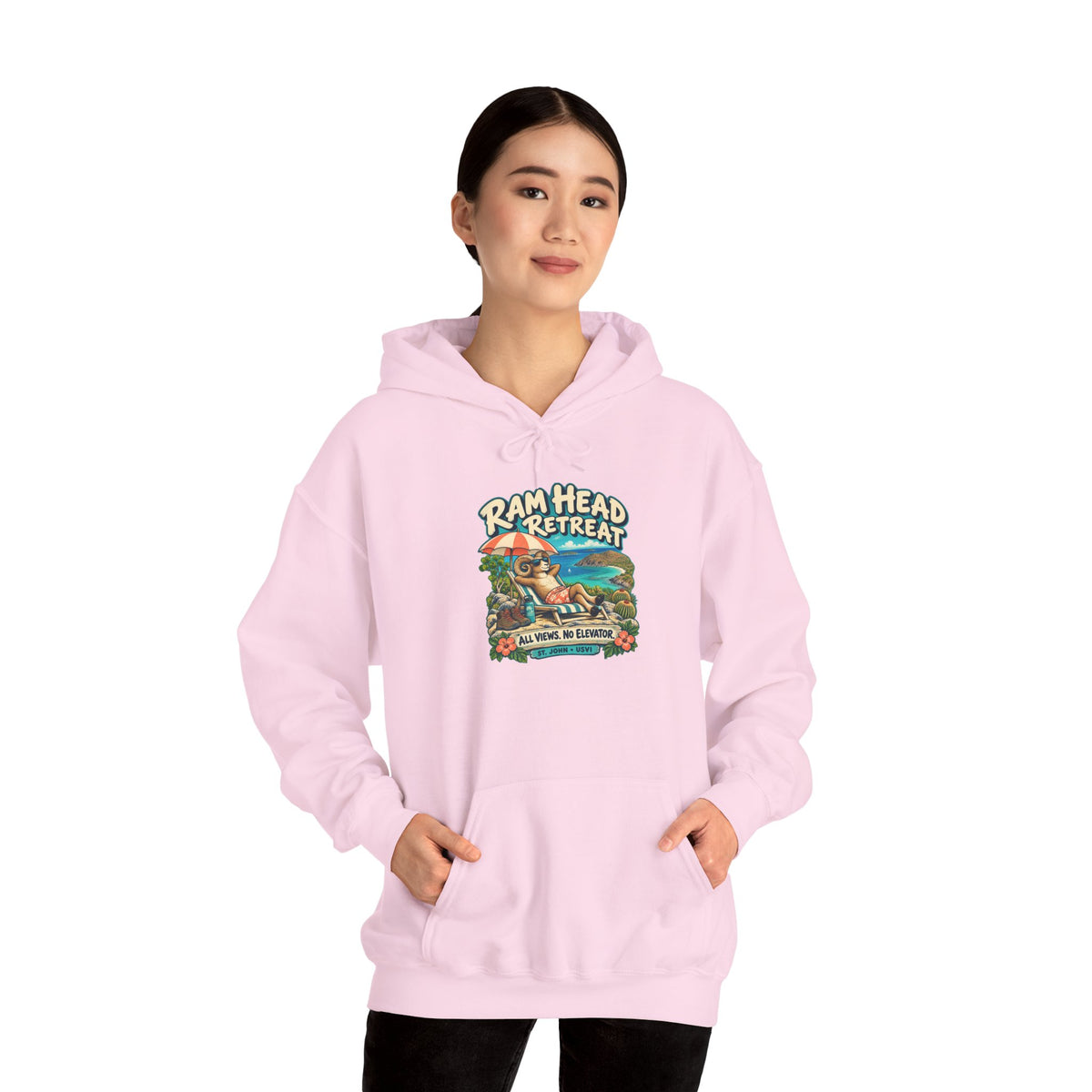 Model wearing a Ram Head Retreat St John USVI Gildan 18500 hoodie with lounging ram artwork.