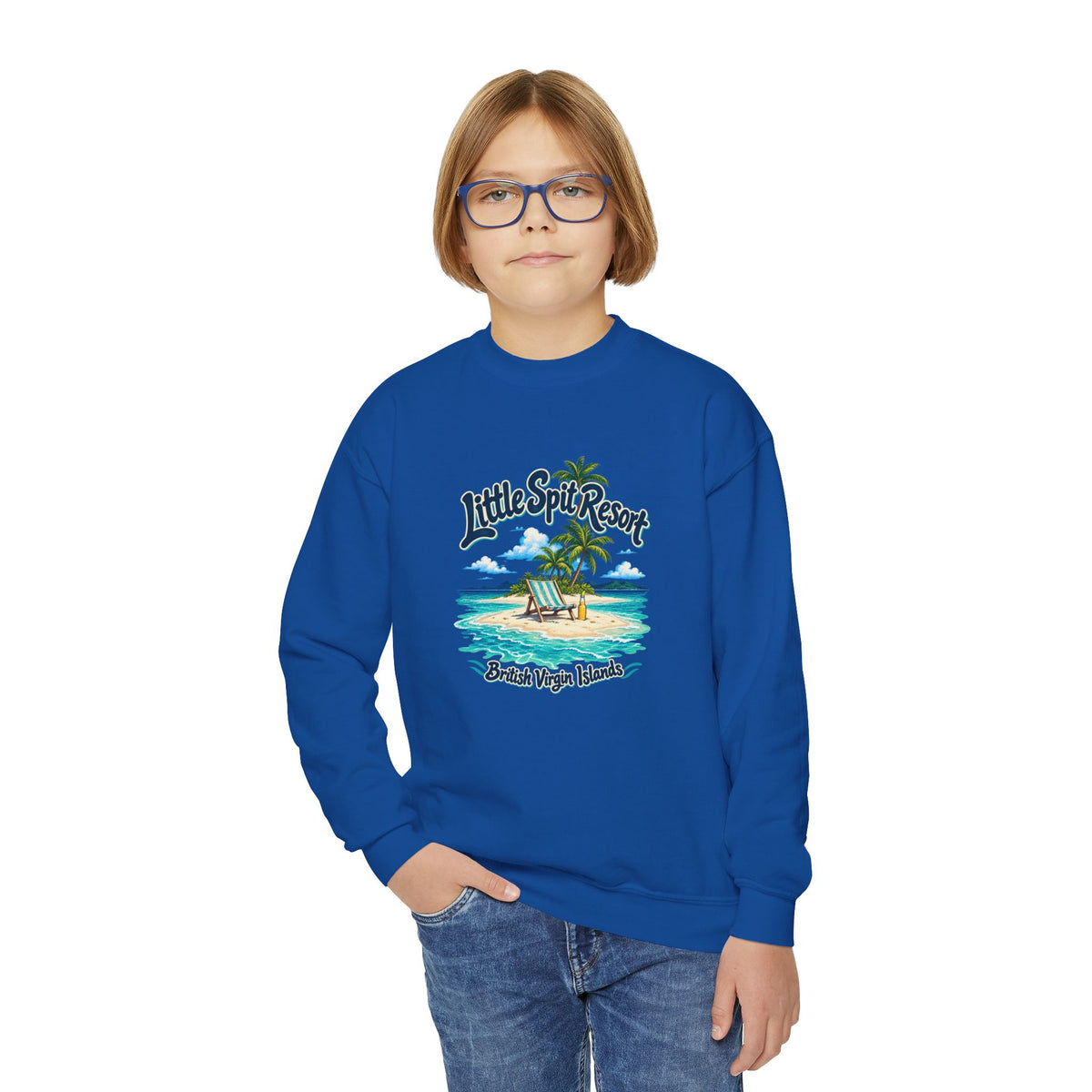 Youth model wearing the Little Spit Resort BVI Gildan 18000B sweatshirt with enlarged tropical artwork aligned high on the chest.