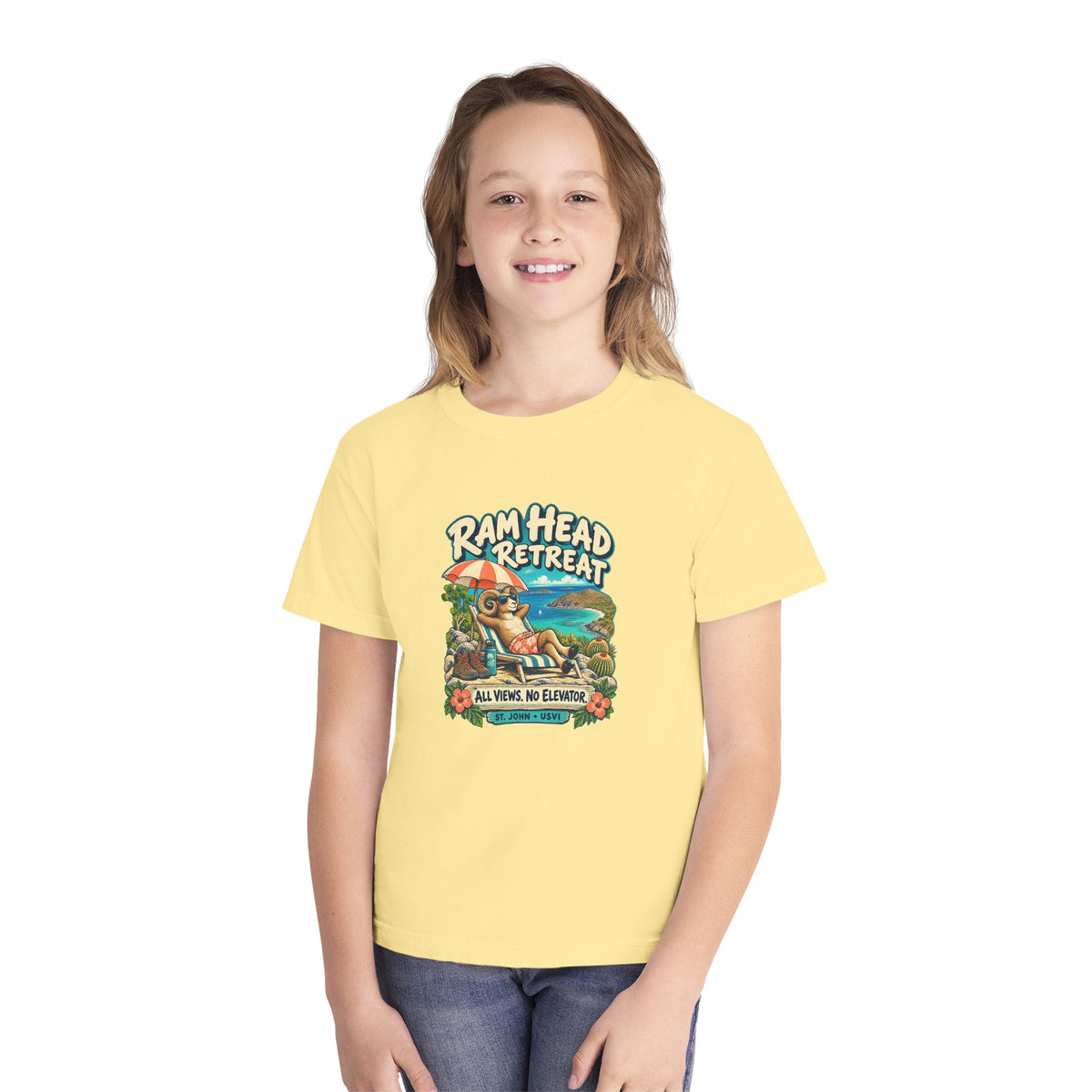 Model wearing Ram Head Retreat St John USVI Comfort Colors 9018 Youth T-Shirt with the lounging ram retreat design.