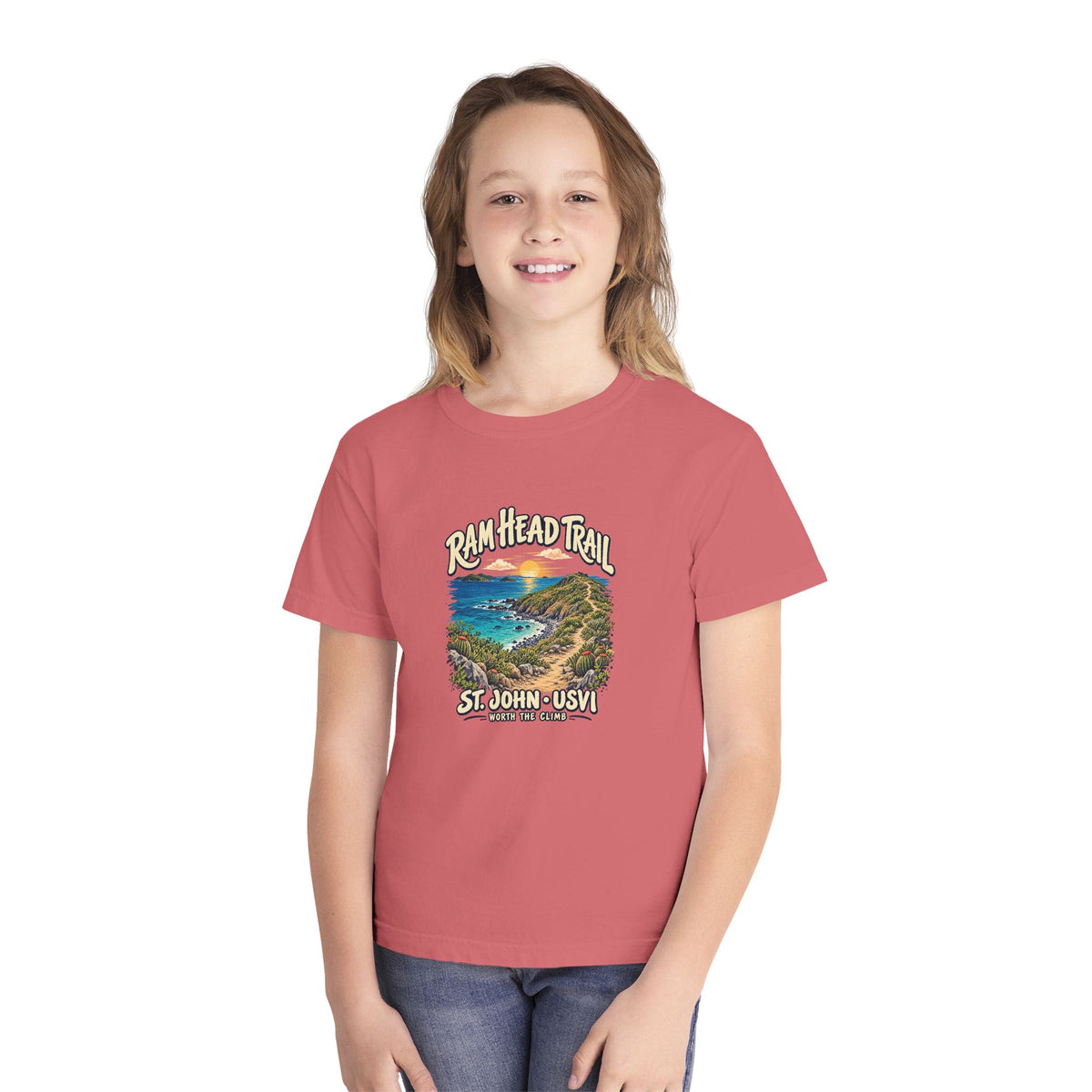 Youth model wearing a Comfort Colors 9018 tee with Ram Head Trail St John USVI coastal artwork.