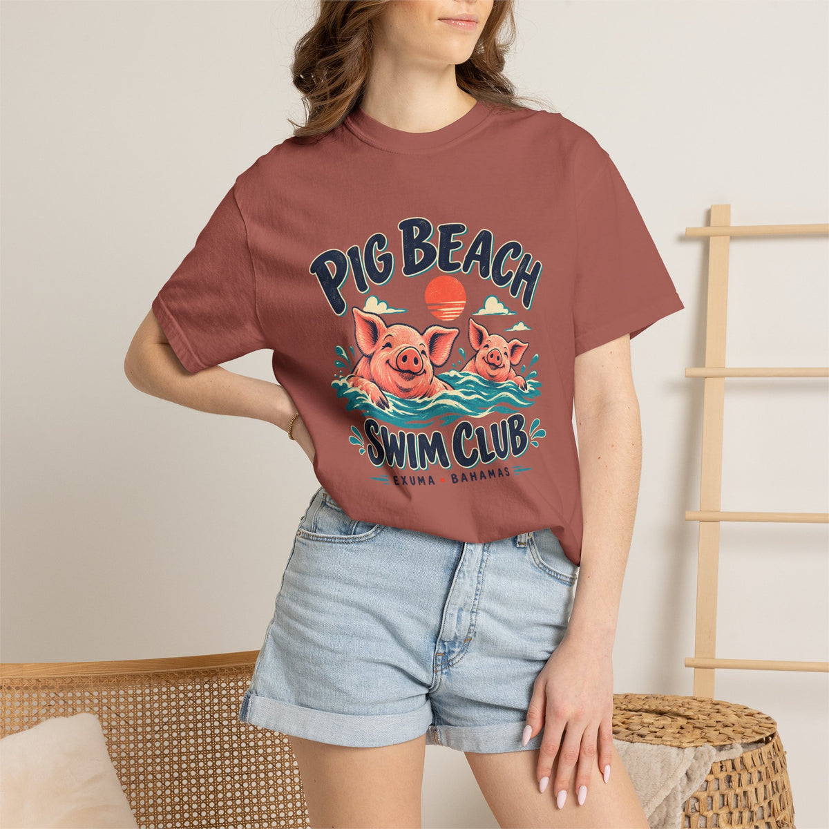 Model wearing the Pig Beach Swim Club Exuma Bahamas Comfort Colors 1717 T-shirt.