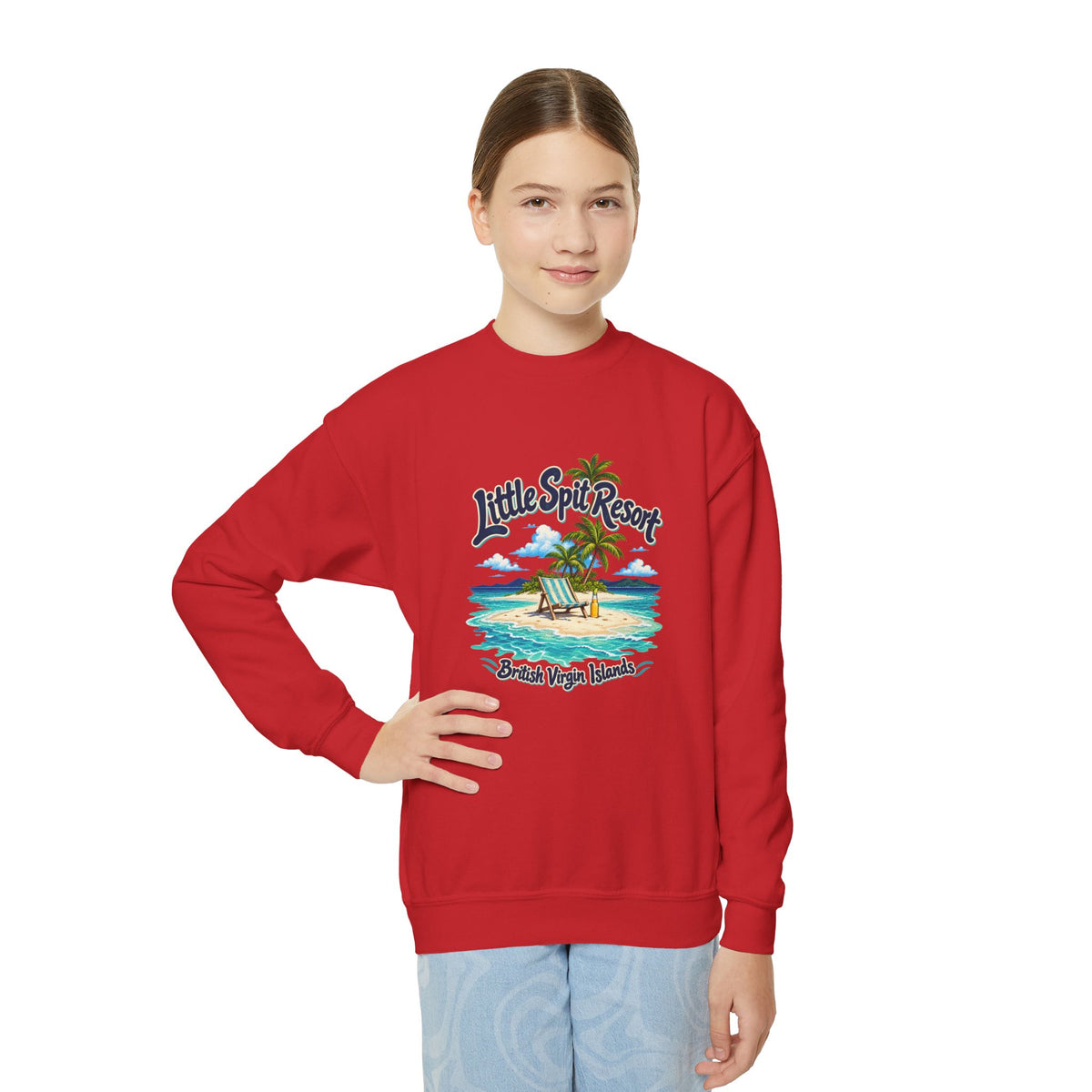 Youth model wearing the Little Spit Resort BVI Gildan 18000B sweatshirt with enlarged tropical artwork aligned high on the chest.