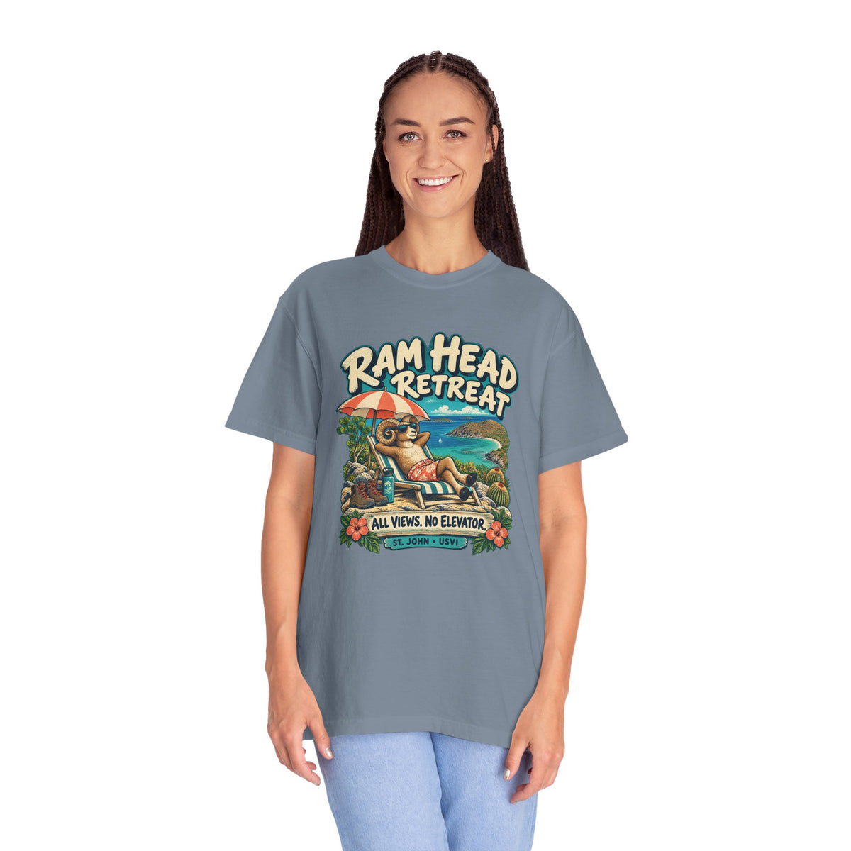 Model wearing a Comfort Colors 1717 T-shirt with the Ram Head Retreat lounging ram illustration and St. John USVI lettering.