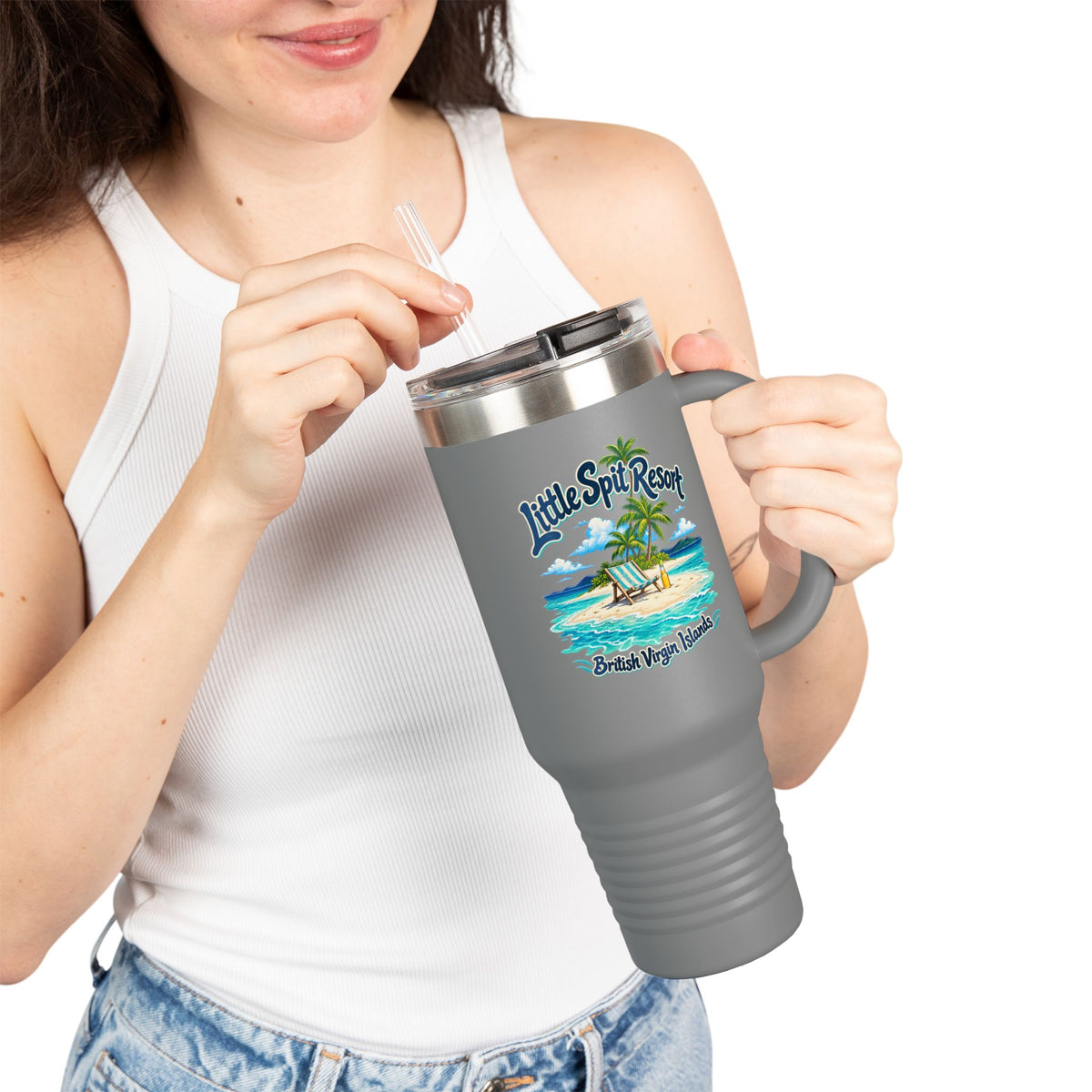 Model holding a Little Spit Resort BVI Polar Camel 40-ounce travel mug with tropical artwork on the front.