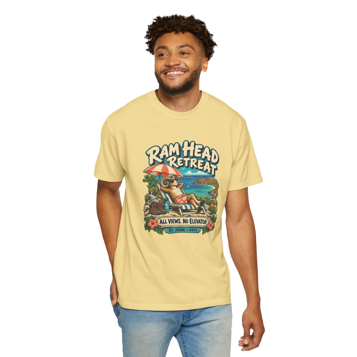 Model wearing a Comfort Colors 1717 T-shirt with the Ram Head Retreat lounging ram illustration and St. John USVI lettering.