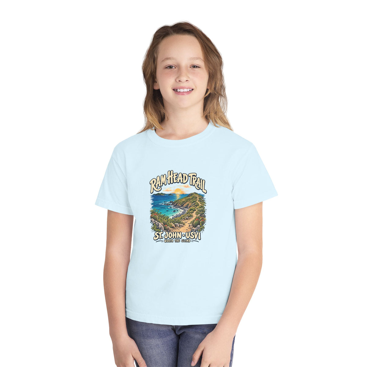 Youth model wearing a Comfort Colors 9018 tee with Ram Head Trail St John USVI coastal artwork.