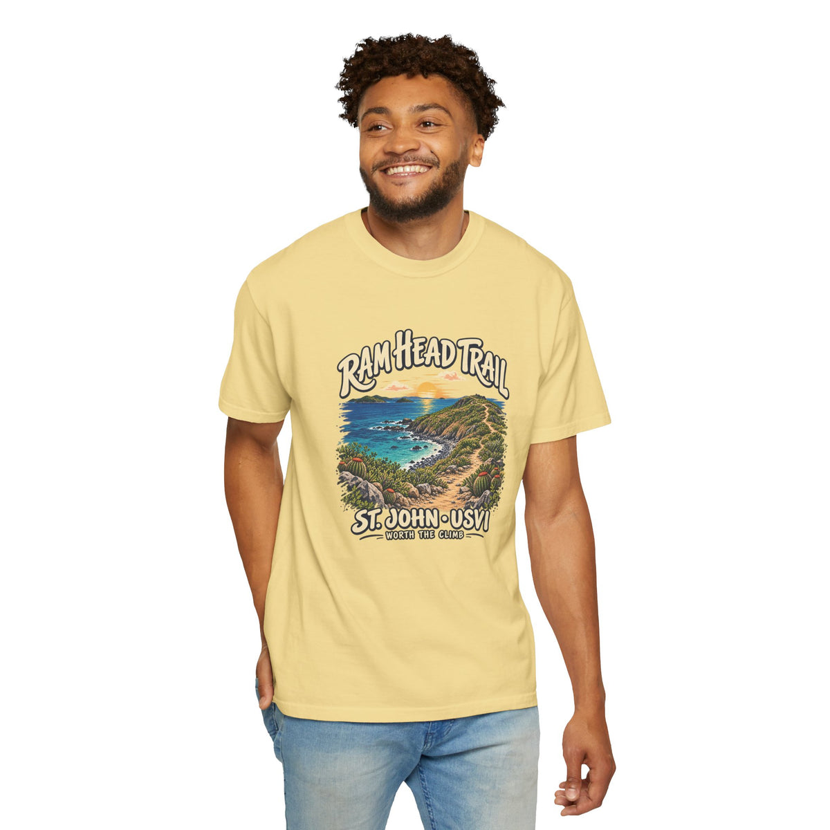 Model wearing a Comfort Colors 1717 T-shirt with the Ram Head Trail coastal illustration and St. John USVI lettering on the front.