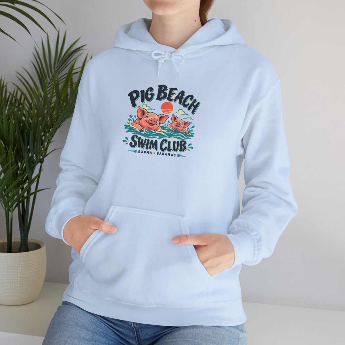 Model wearing the Pig Beach Swim Club Exuma Bahamas Gildan 18500 hoodie.
