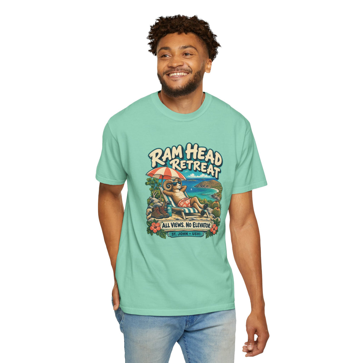 Model wearing a Comfort Colors 1717 T-shirt with the Ram Head Retreat lounging ram illustration and St. John USVI lettering.