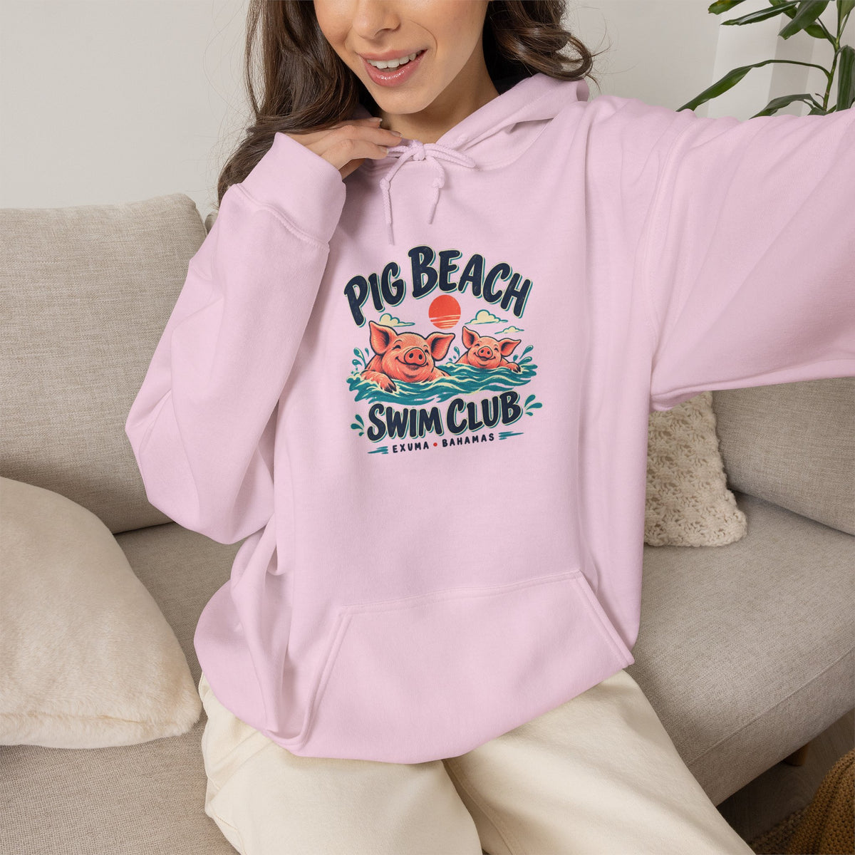 Model wearing the Pig Beach Swim Club Exuma Bahamas Gildan 18500 hoodie.