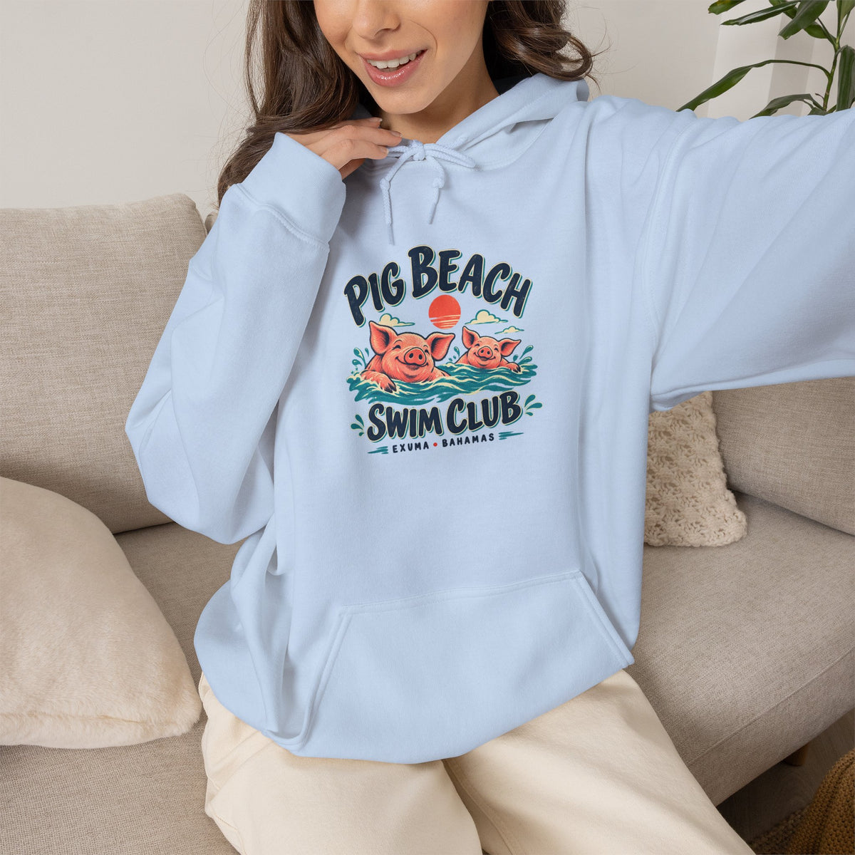 Model wearing the Pig Beach Swim Club Exuma Bahamas Gildan 18500 hoodie.