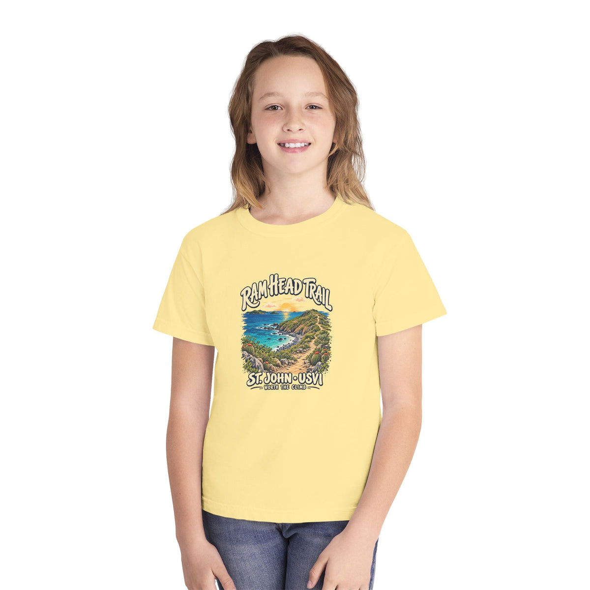 Youth model wearing a Comfort Colors 9018 tee with Ram Head Trail St John USVI coastal artwork.