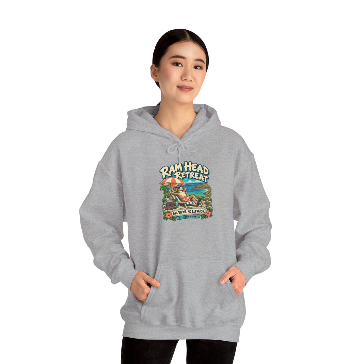 Model wearing a Ram Head Retreat St John USVI Gildan 18500 hoodie with lounging ram artwork.