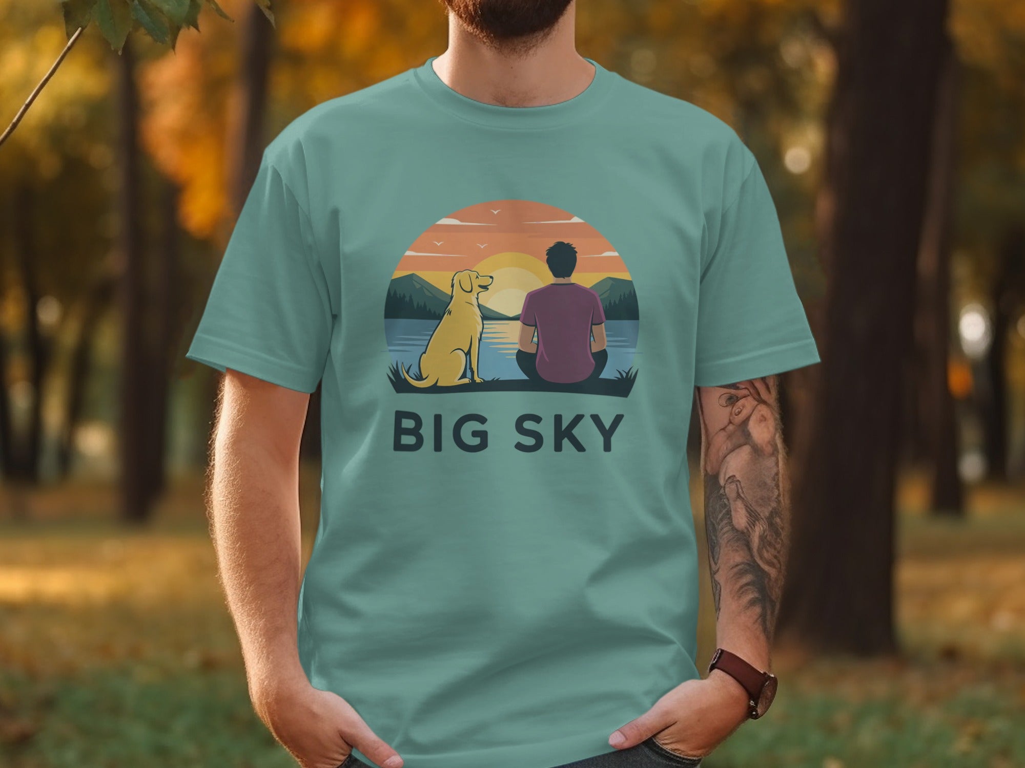 Big Sky Sunset T-Shirt with Man and Dog Design