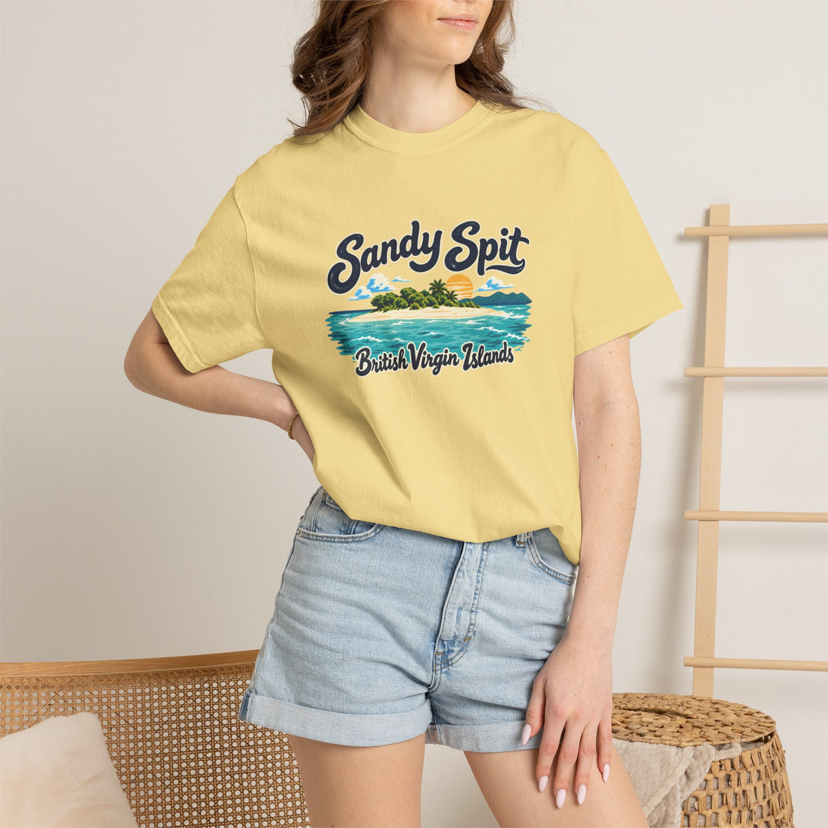Model wearing the Sandy Spit BVI Comfort Colors 1717 T-shirt with colorful palm-tree island artwork and British Virgin Islands lettering.