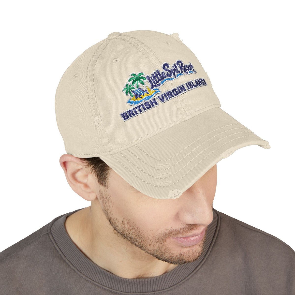 Model wearing the Little Spit Resort BVI embroidered OTTO 104-1018 distressed dad hat, front-view mockup.