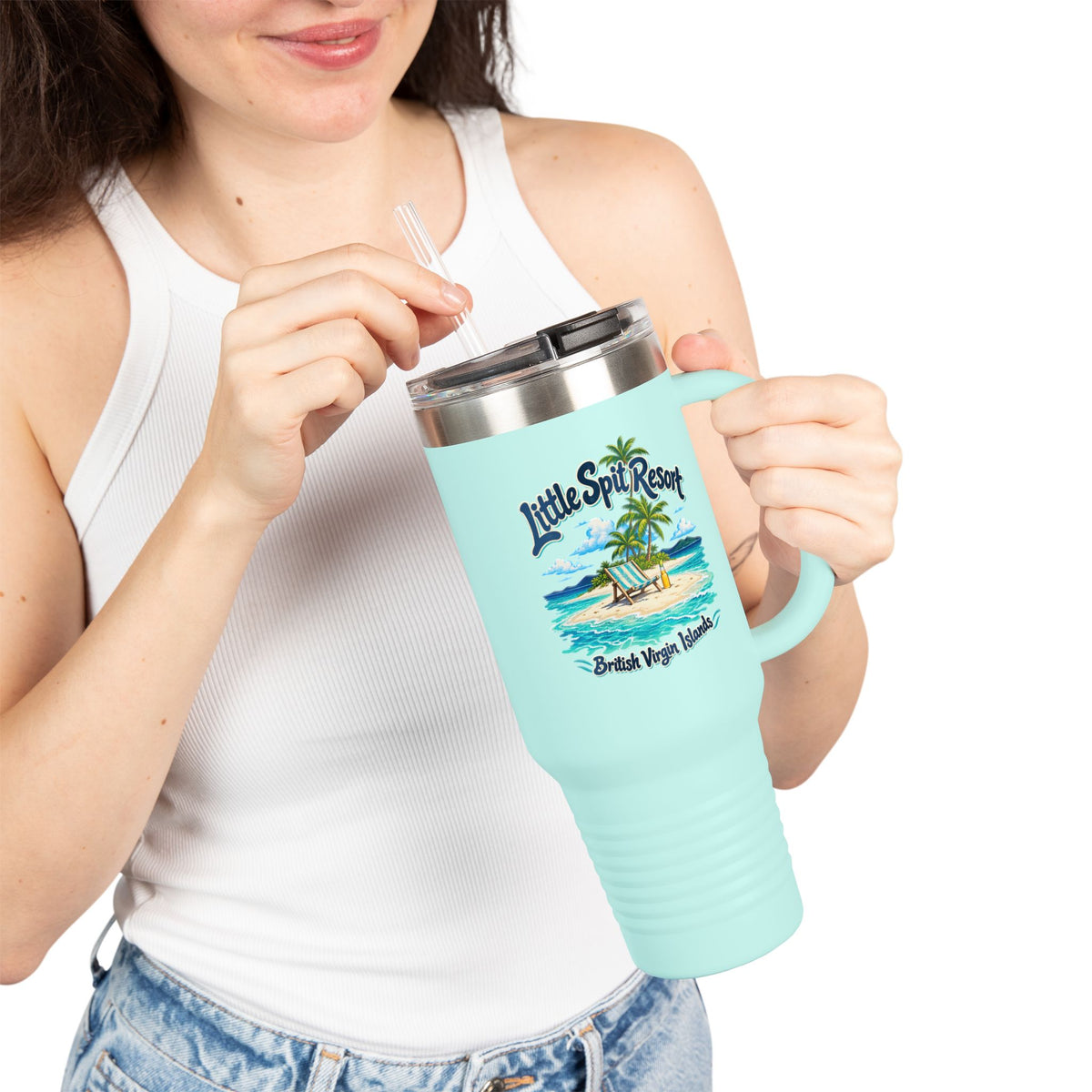 Model holding a Little Spit Resort BVI Polar Camel 40-ounce travel mug with tropical artwork on the front.