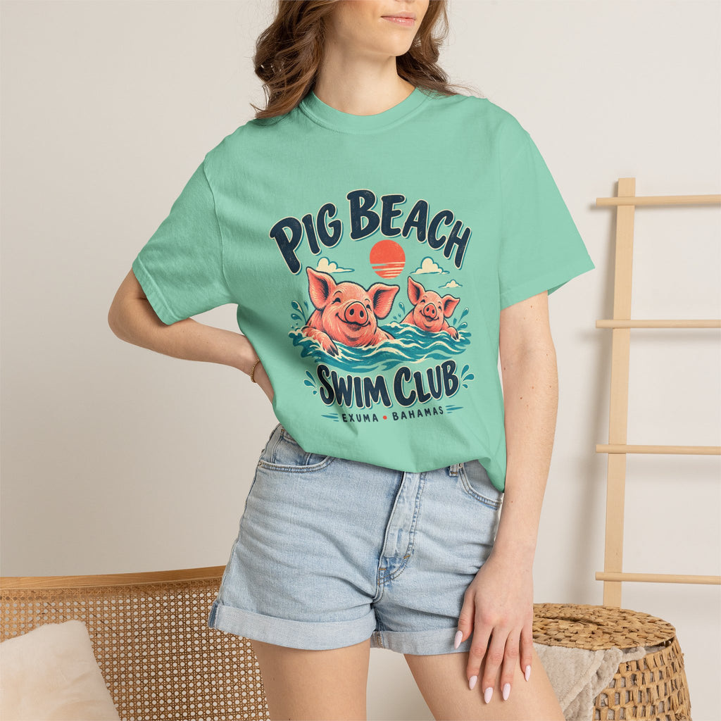 Model wearing the Pig Beach Swim Club Exuma Bahamas Comfort Colors 1717 T-shirt.