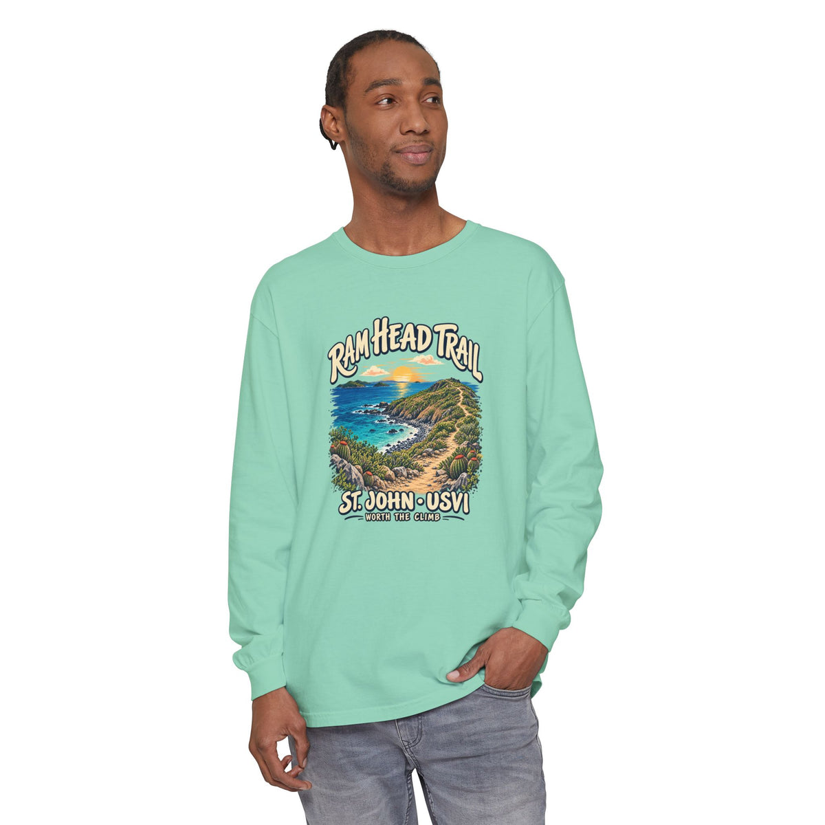 Model mockup of a Comfort Colors 6014 long-sleeve shirt featuring Ram Head Trail, St. John USVI coastal artwork and Worth the Climb lettering.