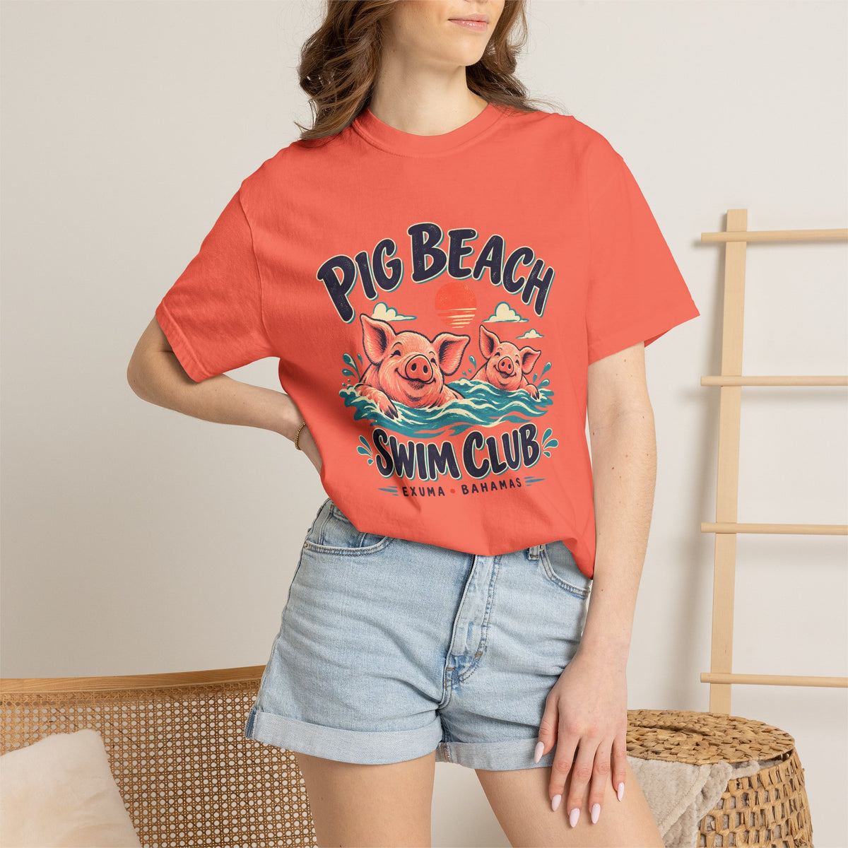 Model wearing the Pig Beach Swim Club Exuma Bahamas Comfort Colors 1717 T-shirt.
