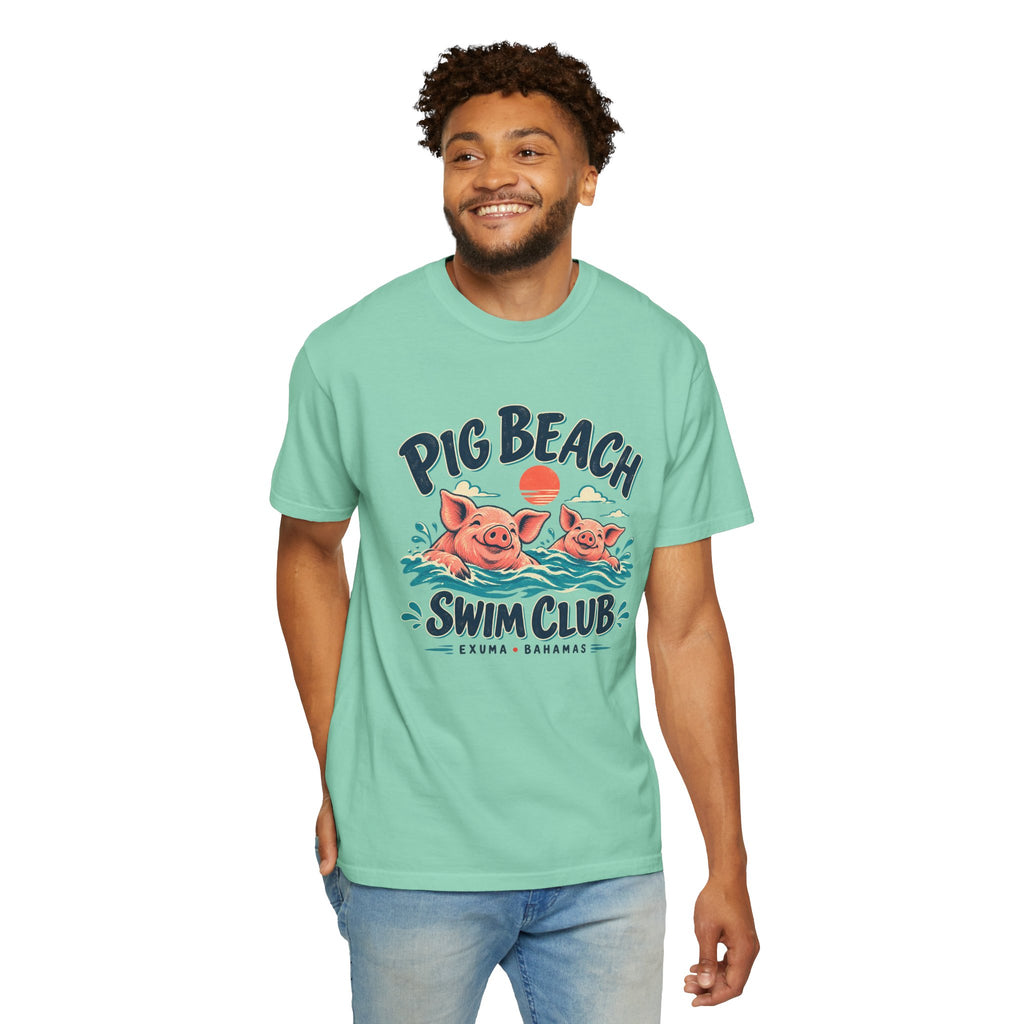 Model wearing the Pig Beach Swim Club Exuma Bahamas Comfort Colors 1717 T-shirt.