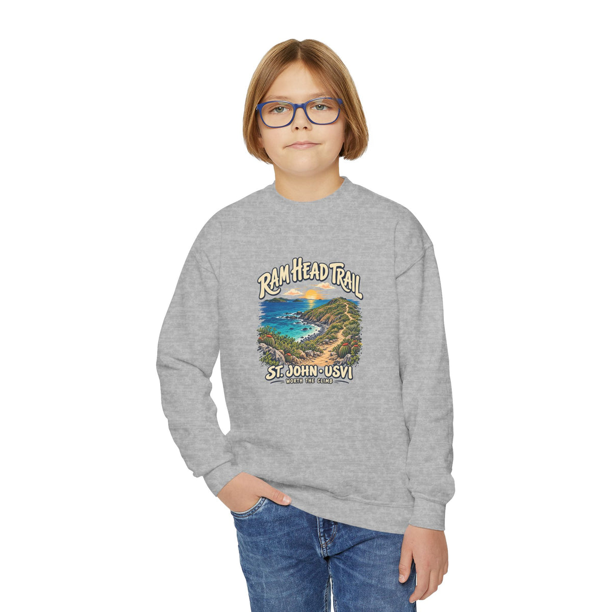Youth model wearing a Gildan 18000B sweatshirt with Ram Head Trail St John USVI coastal artwork.