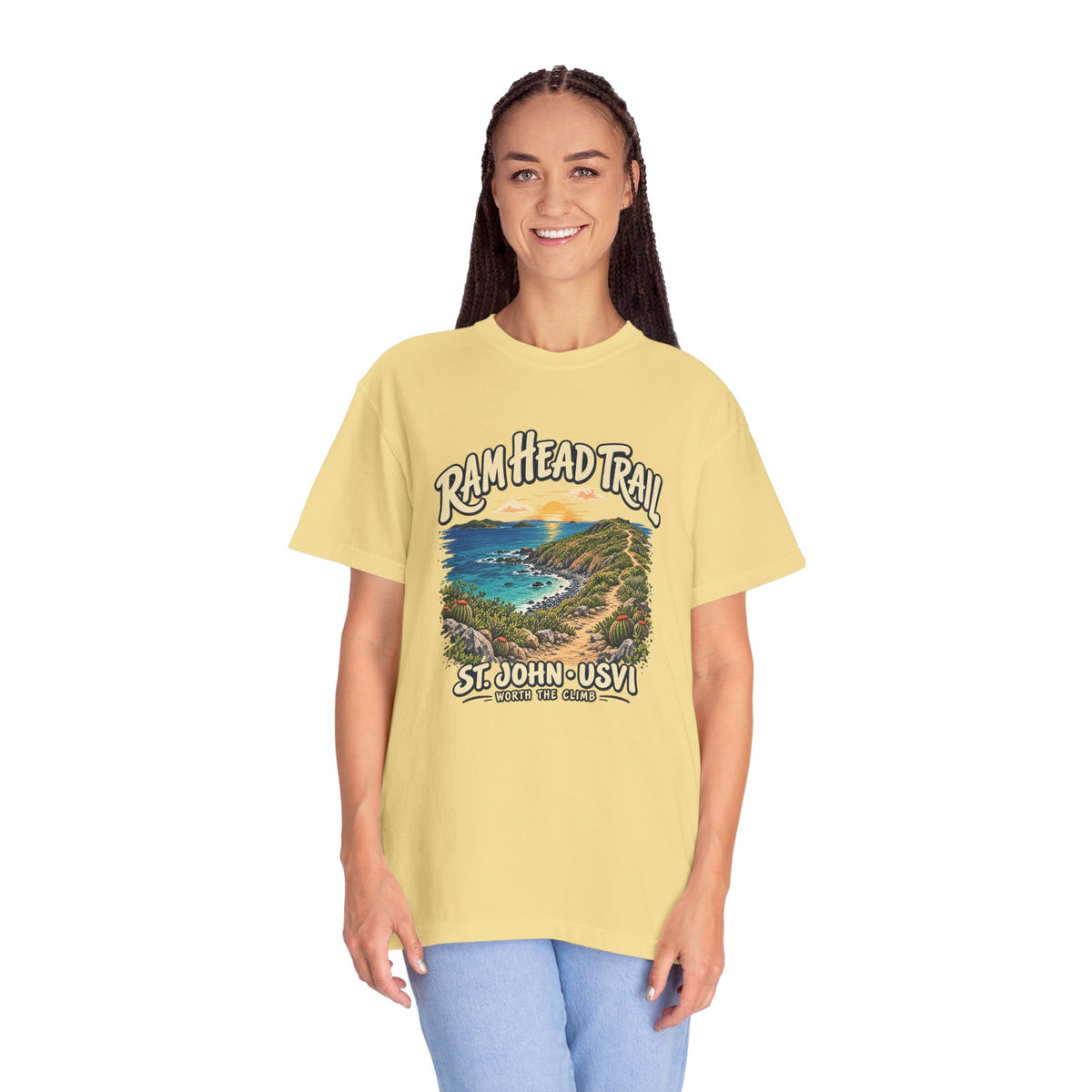 Model wearing a Comfort Colors 1717 T-shirt with the Ram Head Trail coastal illustration and St. John USVI lettering on the front.