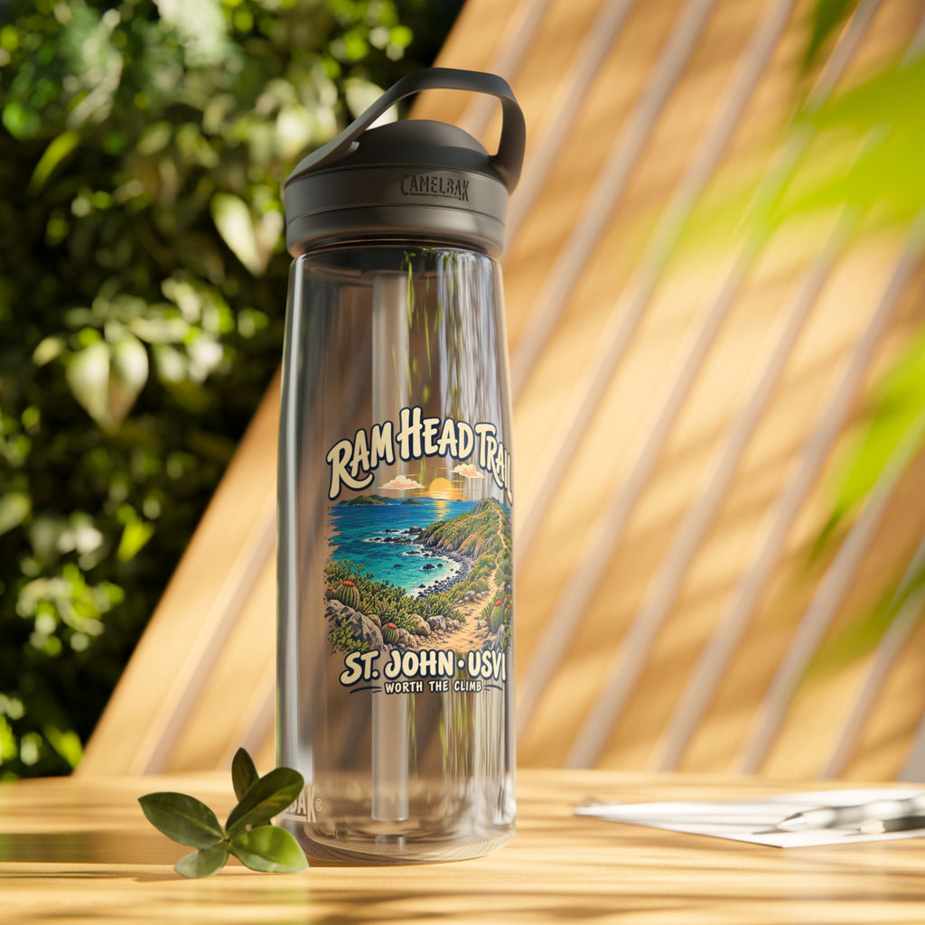 Charcoal CamelBak Eddy 25 oz bottle with Ram Head Trail St John USVI artwork in a lifestyle setting.