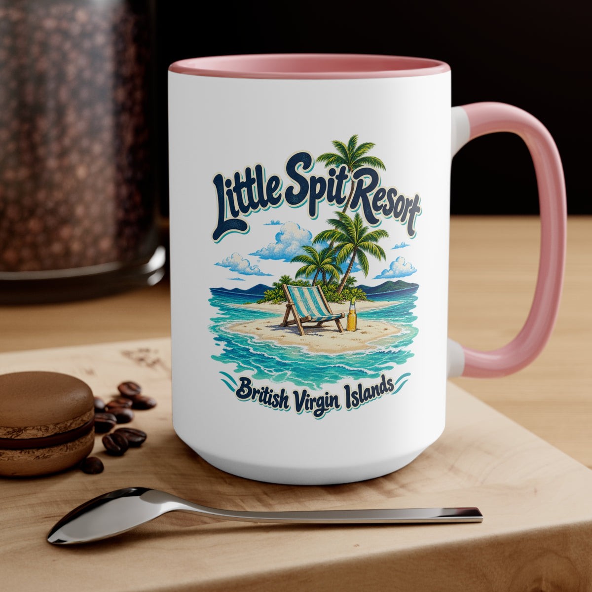 Little Spit Resort BVI accent coffee mug displayed on a tabletop with coffee beans and a spoon.