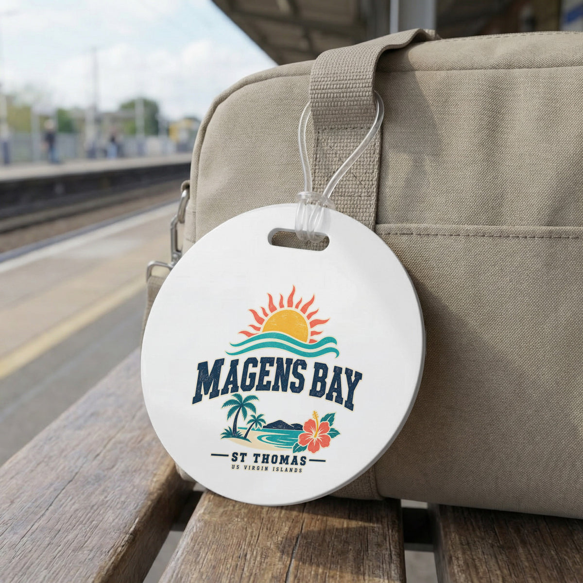 Round Magens Bay St. Thomas US Virgin Islands luggage tag on a tan bag.