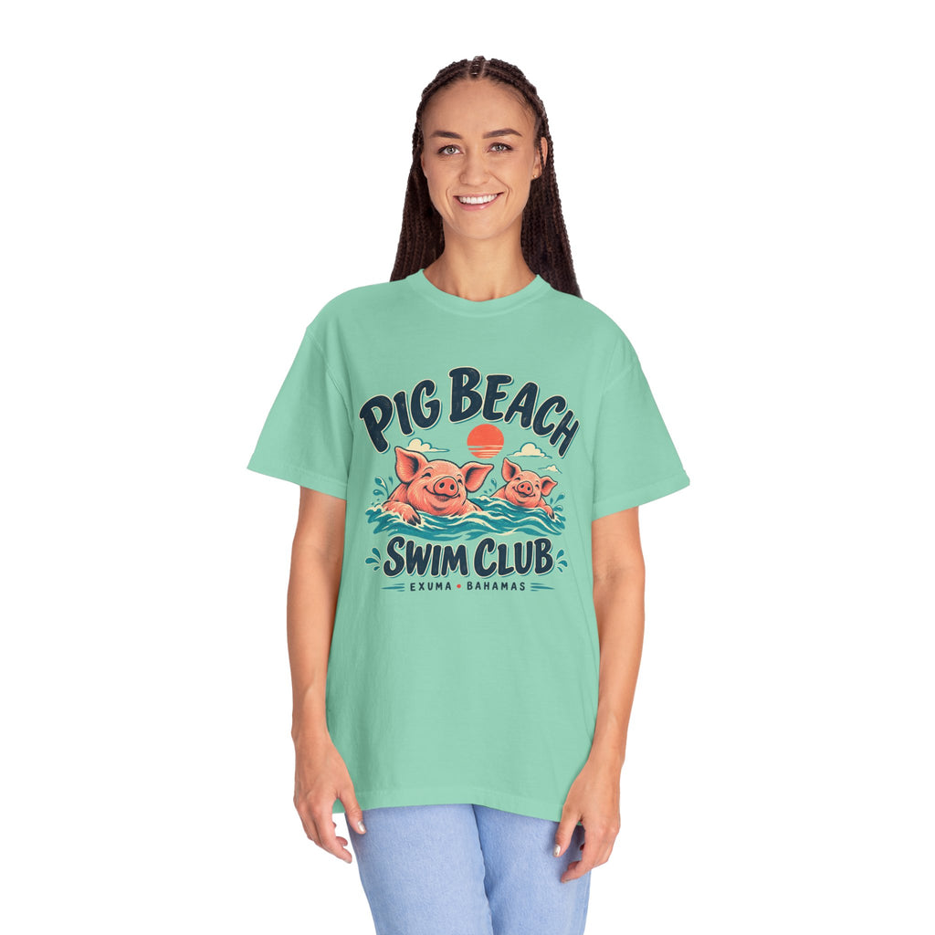 Model wearing the Pig Beach Swim Club Exuma Bahamas Comfort Colors 1717 T-shirt.