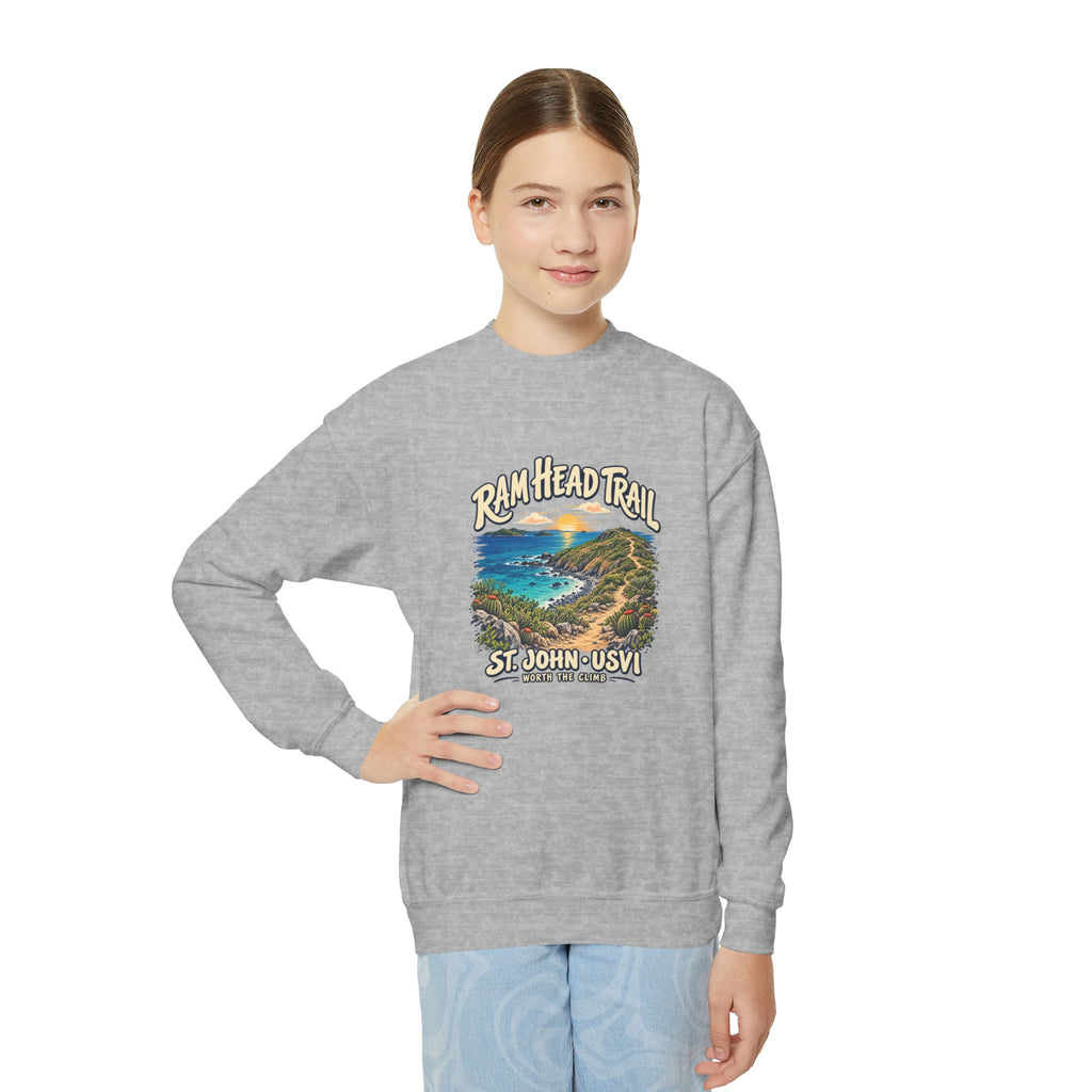 Youth model wearing a Gildan 18000B sweatshirt with Ram Head Trail St John USVI coastal artwork.