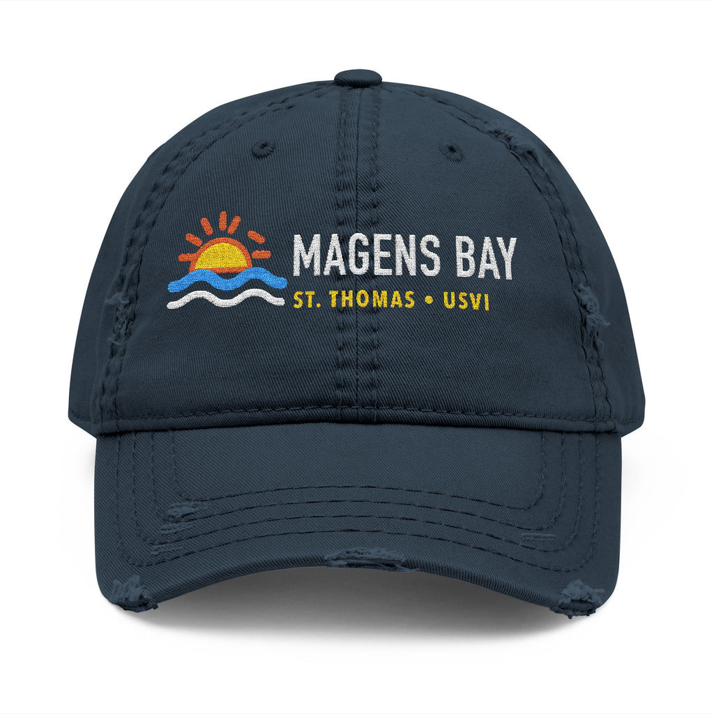Distressed navy baseball cap with embroidered sun, waves, and "Magens Bay St. Thomas USVI".