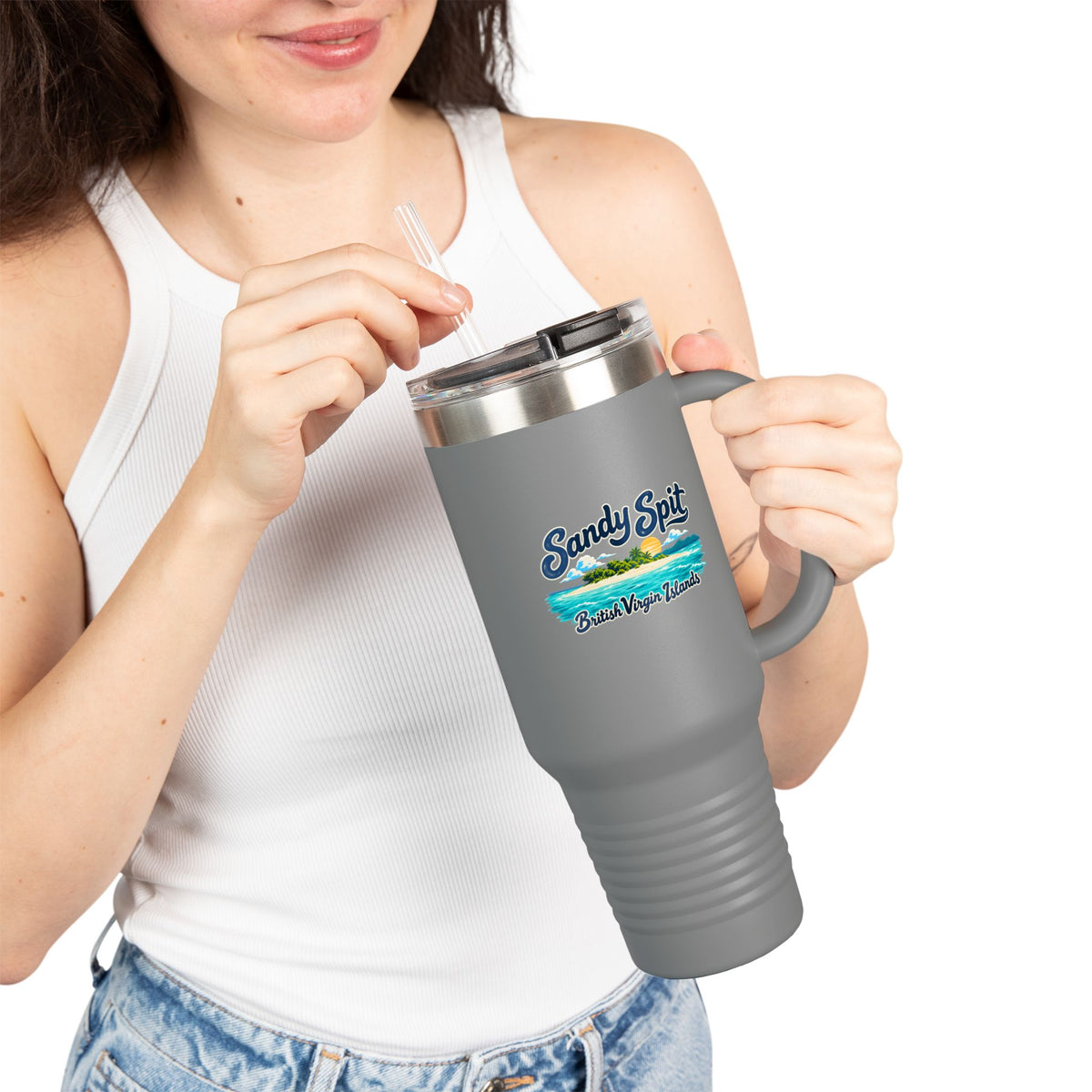Model holding a Sandy Spit BVI Polar Camel 40-ounce travel mug with island artwork on the front.