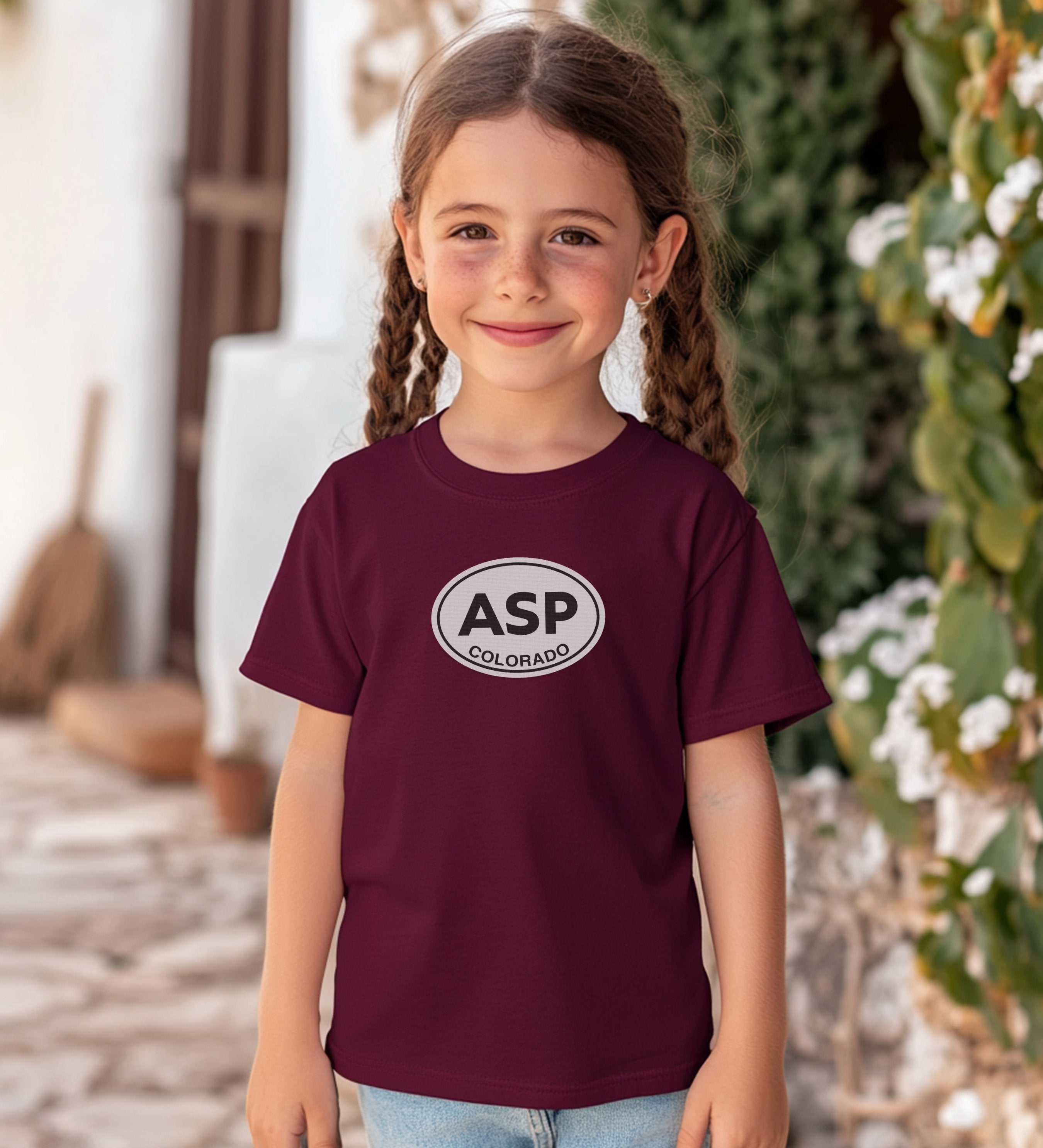Aspen building snowmen in Wagner Park youth clothing and travel souvenirs