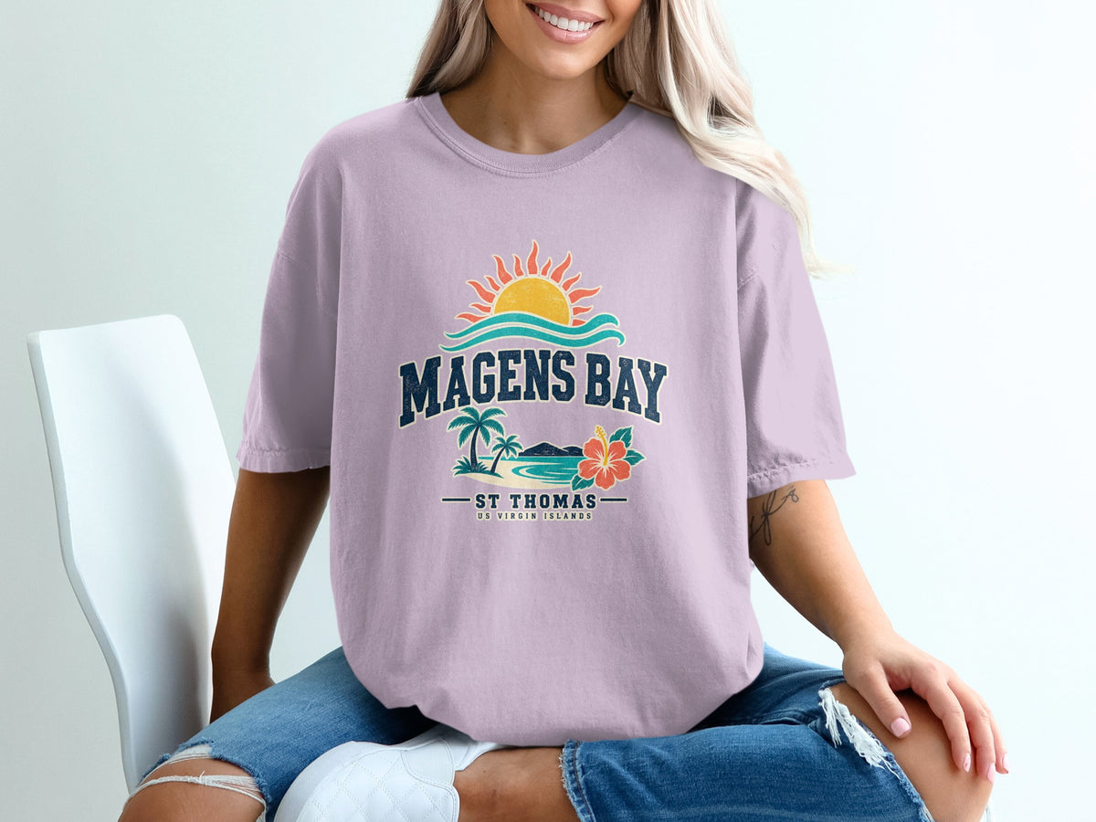 Lavender t-shirt with "Magens Bay St Thomas US Virgin Islands" graphic and tropical design.
