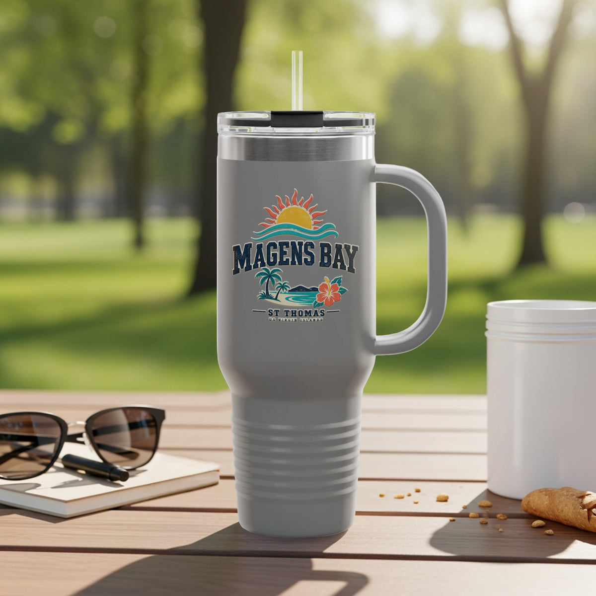 Gray travel tumbler with "Magens Bay St. Thomas" logo and tropical scene.