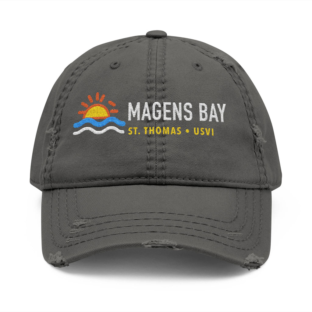 Distressed gray baseball cap embroidered with a sun over waves and "Magens Bay St. Thomas USVI".