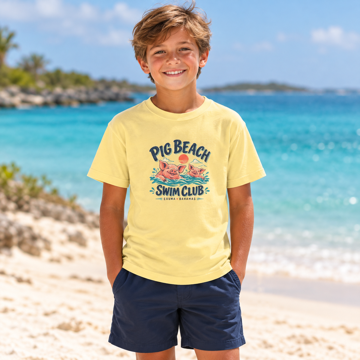 AI lifestyle mockup of a child wearing the butter Pig Beach Swim Club Exuma Bahamas Comfort Colors 9018 youth tee on a tropical coast.